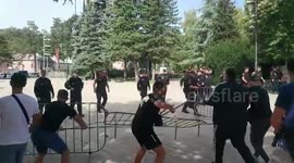 Protesters break down the fence in Cetinje, Montenegro