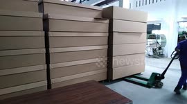 Work in a factory for the production of eco-coffins in Colombo, Sri Lanka