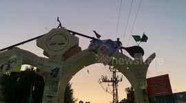 Palestinians take part in a rally as they celebrate the escape of six Palestinians from an Israeli jails