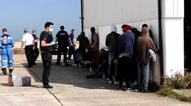 After RNLI safely brought migrants back to shore they headed to be searched and processed 3