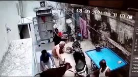 Calf charges into house in India and crashes through cradle where baby was sleeping