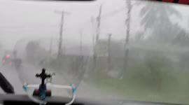 Powerful Typhoon Chanthu brings heavy rain as it passes northern Philippines