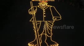 Timelapse video of a big lamp art of a famous Tamil poet is created in South India