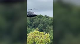 Hollywood superstar Tom Cruise waves at fan from helicopter whilst filming Mission Impossible 7