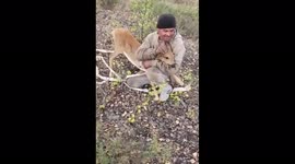 Man rescues deer that had fallen down deep hole in Russia