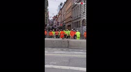 Swedish construction workers spotted limbering up together in amusing footage