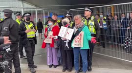 Group of anti-war protesters block the entrance of ExCel  building as DSEI weapons fair starTs