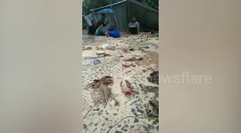 Pensioner stuck in water rescued after landslide hits his home