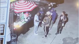 DaBaby's entourage caught on security camera beating up two fans in a car park