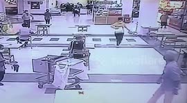 Hero shopper trips over armed robber trying to escape from scene