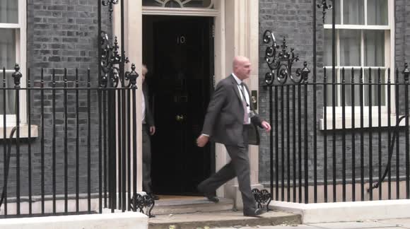 Boris Johnson leaves 10 Downing Street to attend Prime Minister's Questions - Slow Motion.