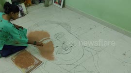 Artist in South India draws a portrait of Annadurai the iconic politician of India and  famously called as South India’s George Bernard Shaw by Western Media.