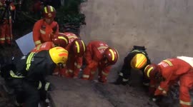 China earthquake rescue teams search through rubble for survivors