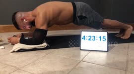 Aussie man with chronic pain takes world record for longest abdominal plank hold