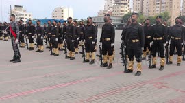 Palestinian policemen wearing protective face masks show their skills during a graduation ceremony, amid concerns about the spread of the coronavirus disease (COVID-19)