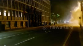Burning torch at the door of the parliament in Ljubljana, Slovenia
