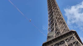 Eiffel? No I stayed upright! Man tightropes across iconic French landmark
