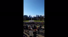 Police view and view from the steps of the Memorial Monument in a crowd of protesters in Melbourne, Australia