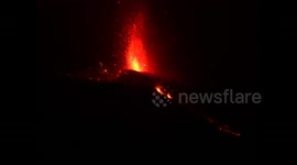 Double magmatic eruption lights up La Palma for third night of fiery fury