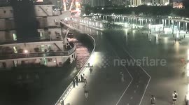Locals flee as ship slams into embankment damaging guardrails in China