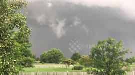 Tornado forming over golf course
