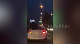 Jilted boyfriend clings onto ex’s car ROOF as she tries to flee