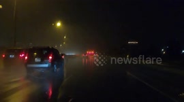 Toronto pelted for hours by hurricane like rain storm reducing visibility on roads and highways for drivers who ventured out in the severe weather