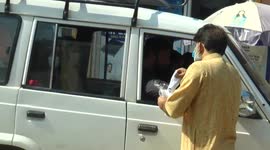 Authorities in Srinagar, northern India, distribute masks and sanitizer in bid to ward off third Covid wave
