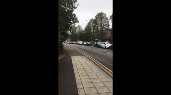 Gridlocked traffic as cars queue to buy petrol in north London's Cockfosters
