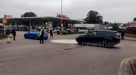 Fuel Panic Crisis HGV driver shortage Cars waiting Fuel at supermarket forecourt
