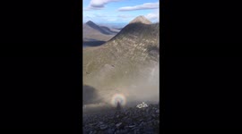 British hiker films rare rainbow from summit of Scottish mountain