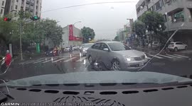 IDIOT ON THE ROAD: VW Driver's U-turn On A Busy Intersection Ends In Collision With Moped Riders (Dashcam Video)