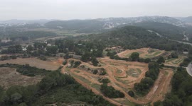 Motocross circuit with overhead plane. Dirtrack circuit and house belonging to the farm