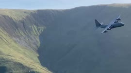 Mach Loop, x2 Strix usaf C130 Hercules flying low level in the valleys