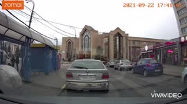 The car almost hit a baby stroller