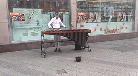 Talented street musician plays on streets of Nürnberg, Germany