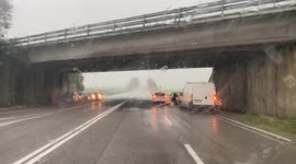 Storm Chasing, Driving through a severe weather warning with straight line winds and a possible tornado whilst cars pull over to safe place in the road.