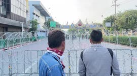 Protesters fire water rockets at police during clashes in Bangkok, Thailand