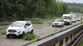 STORM CHASER GETS CAUGHT IN A HAIL STORM CAUSING MASSES OF DISRUPTION ON THE MAIN HIGHWAY IN FRANCE
