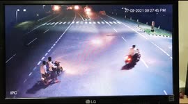 Passenger leaps off motorcycle to avoid high-speed collision with car in India