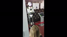 Children watching robots at the exhibition, Minsk, Belarus