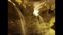 Underground waterfalls inside Cathedral Cave at Dan-yr-Ogof / National Showcaves Centre for Wales