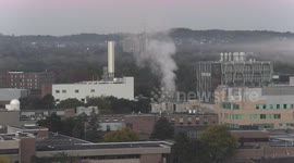 Stunning effect over city this morning as low level temperature inversion traps exhaust emissions and smog from industry into a blanket layer hanging at low level in the atmosphere until the sun burned it off.