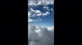 Clouds filmed from an airplane, steady video with a beautiful view of the clouds