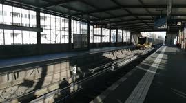 a man on the streets of Berlin draws beautifully to the accompaniment of meditative music.