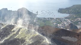 Tourists seen in midst of gas emitted from volcano on Italian island of Vulcano