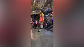 Real-life Squid Game doll entertains shopping mall visitors in the Philippines (contains shows's audio)