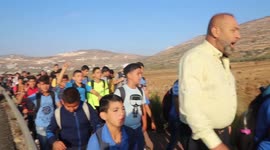 Israeli forces try to prevent Palestinian students from going to their schools in al Lubban ash Sharqiya near Nablus