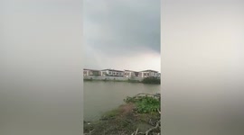 Homes damaged by dust devil tornado in Bangkok, Thailand (6)