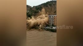 Massive landslide crashes down mountainside in Shanxi, China